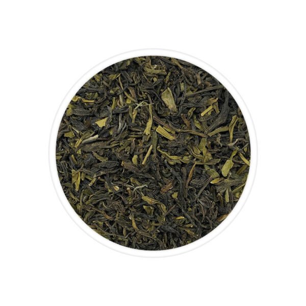 A view of Giddapahar Green Tea, featuring a cup of freshly brewed tea with a golden hue, set against a backdrop of tea leaves and a tea plantation.