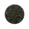 presentation of Chabessey Green Tea, displaying a delicate cup of green tea, emanating steam, placed gracefully amidst tea leaves and a tea garden landscape.