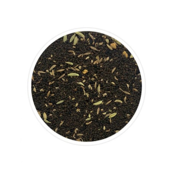 A cup of Herbal Five Spice Tea, a rich blend of CTC tea, fenugreek, cumin, fennel, ajwain, and black cumin for digestion and wellness.