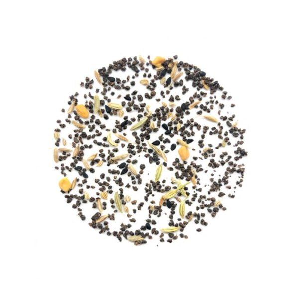 A cup of Herbal Five Spice Tea, a rich blend of CTC tea, fenugreek, cumin, fennel, ajwain, and black cumin for digestion and wellness.