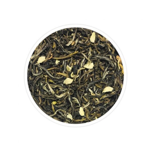 A cup of Jasmine Green Tea, a fragrant blend of Darjeeling green tea and jasmine blossoms, known for its calming aroma and health benefits